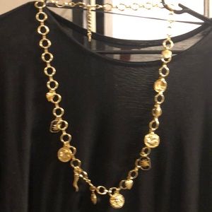 Gold tone charm necklace by Melania Trump